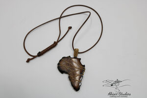 Africa Shaped Cowbone Wire Wrapped Pendant.